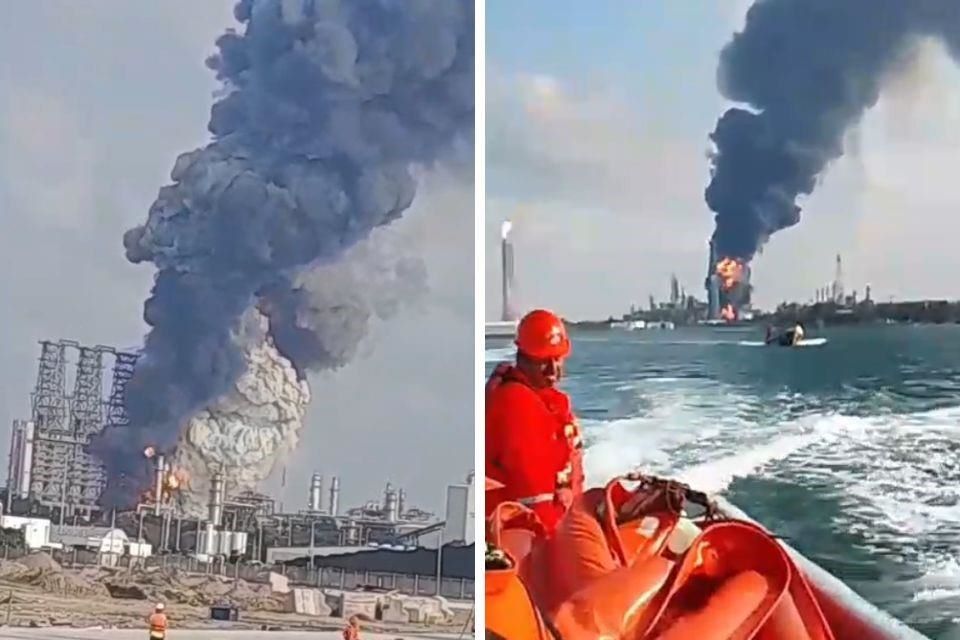Incendio en refinería Olmeca visto desde el mar con humo negro y llamas